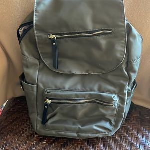 Like-new Steve Madden olive nylon small backpack with black trim, gold hardware